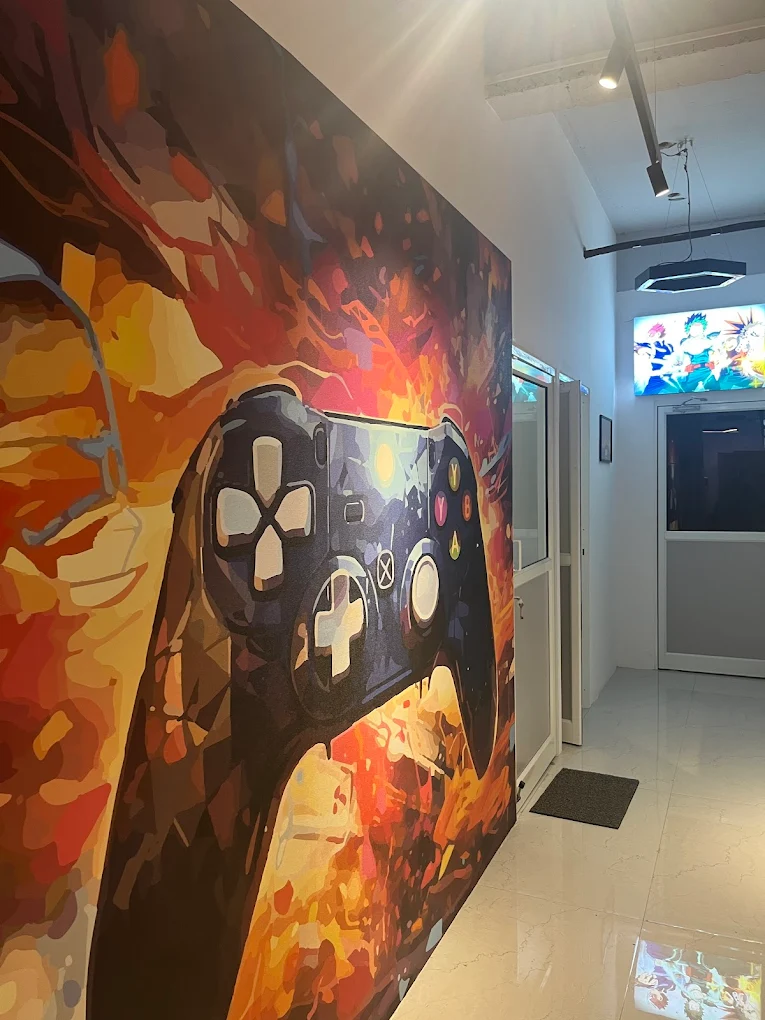Hand-painted gaming mural on the wall inside Intencity Gaming Cafe, Pune